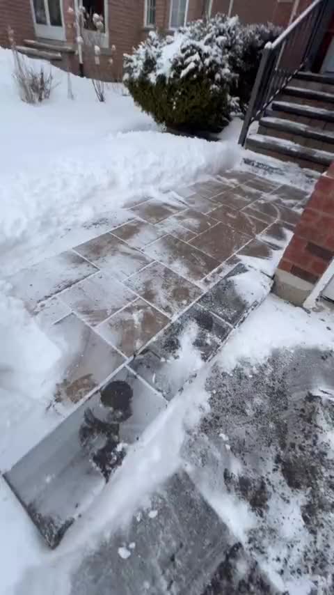 Cleared walkway and steps after a snowfall